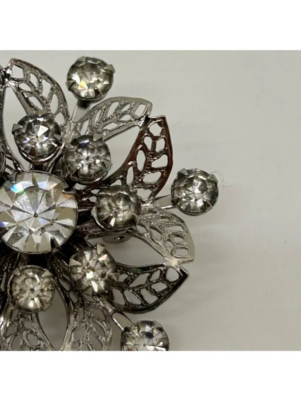 Vintage Silver Tone Rhinestone Brooch Pin Clear Crystal Floral Filigree Mid Cent